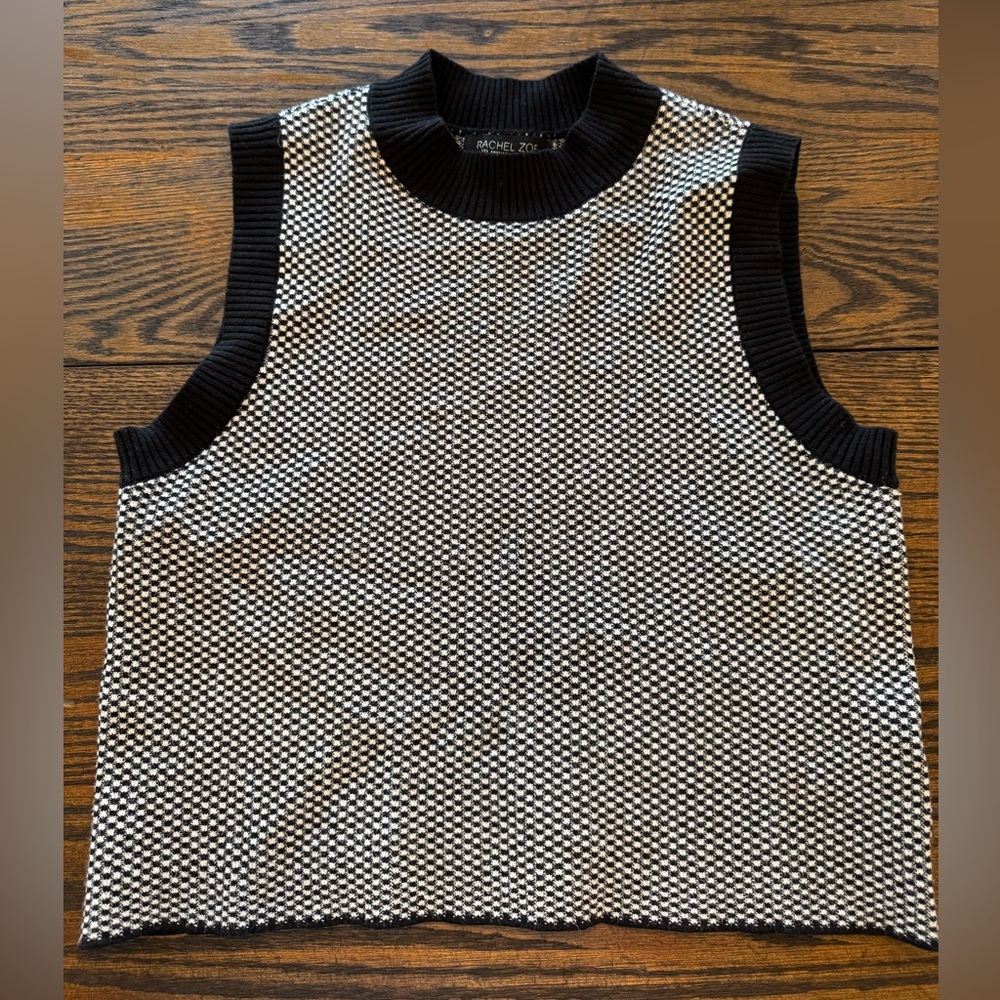 Small Rachel Zoe sweater vest. Only worn a few times perfect condition.